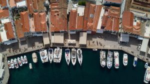 aerial-view-boats-port-hydra-island-greece_181624-53079