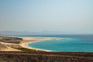 sandy-beach-blue-sea_657883-104